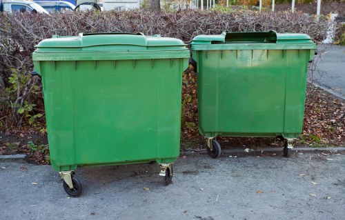 Workers safely removing building waste