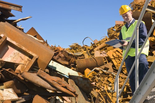Material recovery facility conveyor sorting recyclables