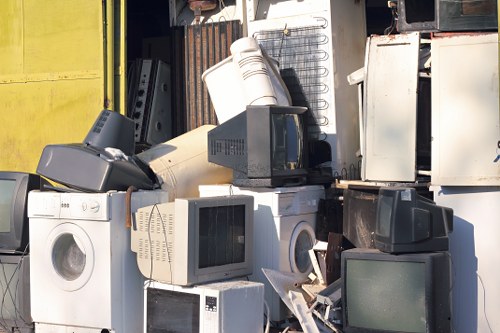 Recycling center in Brompton handling old furniture